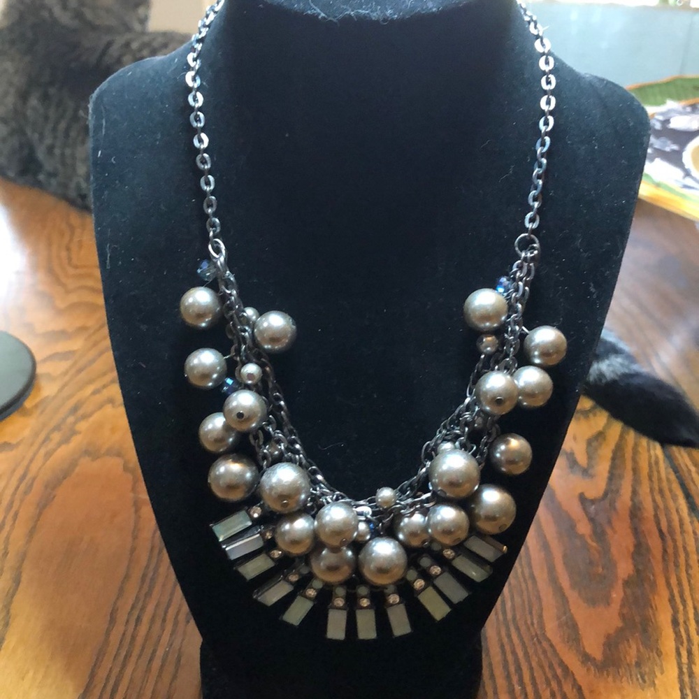 Gorgeous gun metal blue rhinestone silver tone baubles. 17” necklace.